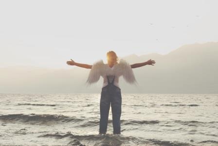 angel woman with open arms messenger of freedom and respect for nature moon meditation - The Breath Psychologist